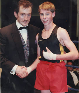 Alan Daly. The champion boxer being congratulated by Irish boxing champion, Barry McGuigan