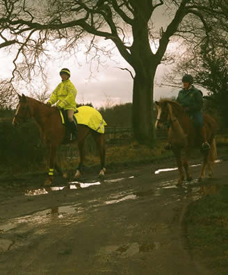 Helen on Breeze with friend - to show advantage of high vis