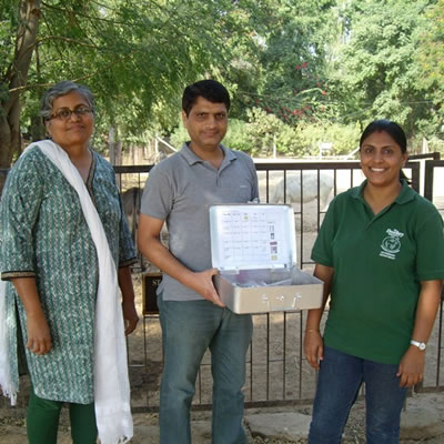 Charity staff in Ahmedabad, India with a building site medical kit.